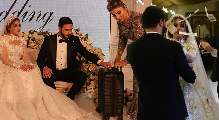 Dudak uçuklatan milyonluk düğün! Geline bir valiz dolusu altın takıldı