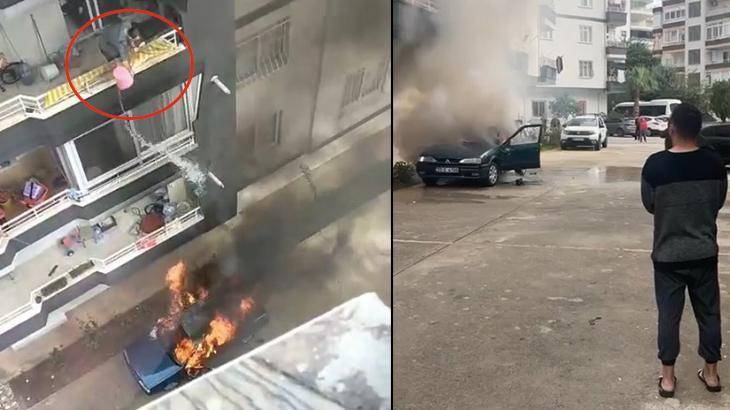 Yanan araca balkondan müdahale etmeye çalıştı! O anlar kameraya yansıdı