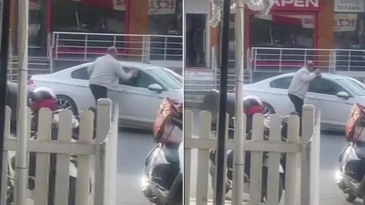 Otomobile kaldırım taşı ile saldırdı, camı kıramayınca uzaklaştı