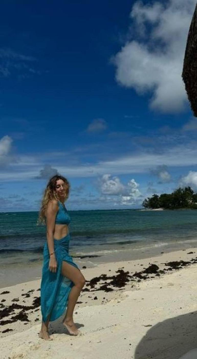 Sinem Kobal eşi ve kızlarıyla tatile çıktı! Kar kıştan kaçıp güneş keyfi yaptı