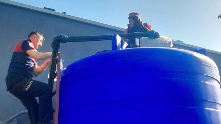 Depoda mahsur kalan kadının yardımına itfaiye koştu